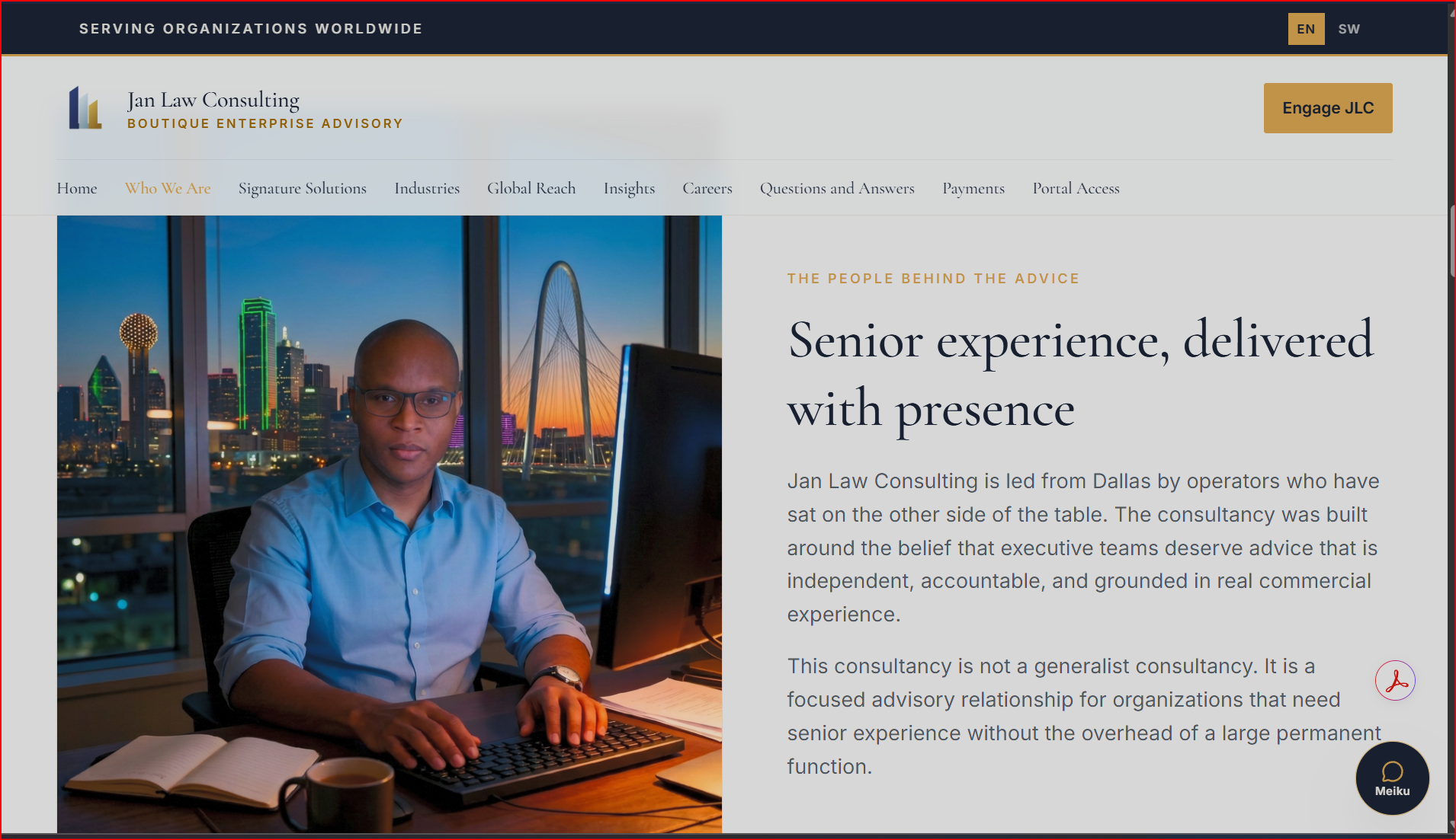 Senior operator at a Dallas office desk at dusk